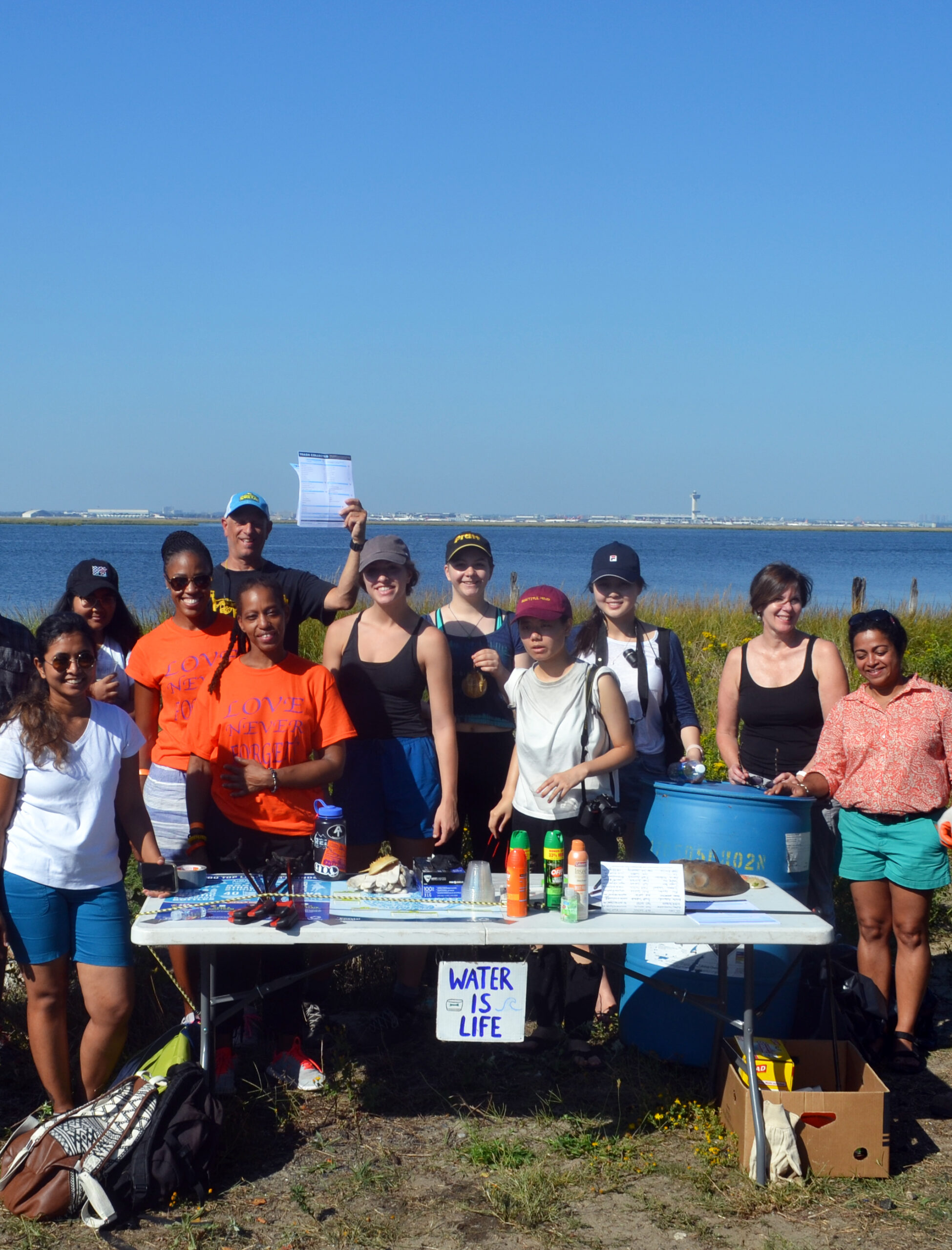 GCPE students clean the beach at Jamaica Bay during Earth Action Week