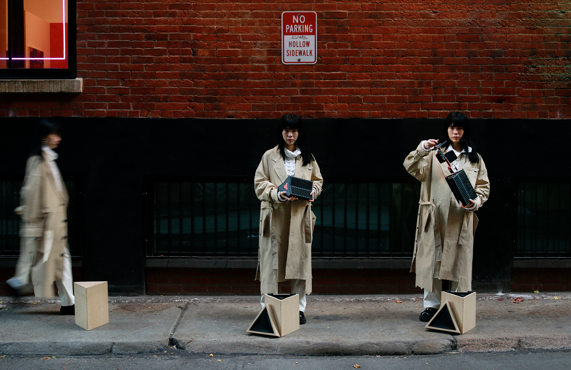 Photograph of the physical archive, held by a female model showing the process of how the archive is found, operated and opened.