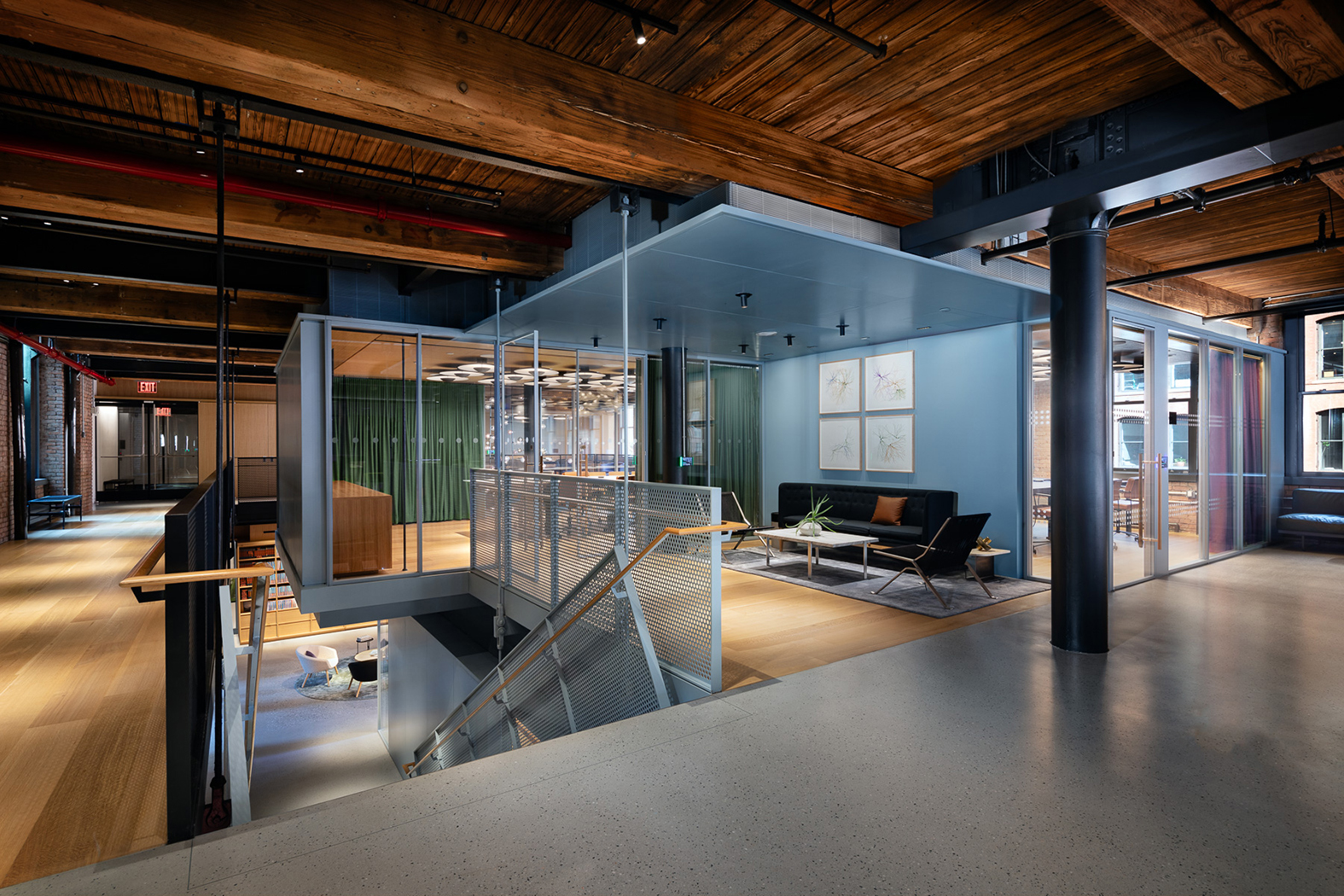 View of office interior toward Suspended Stair.