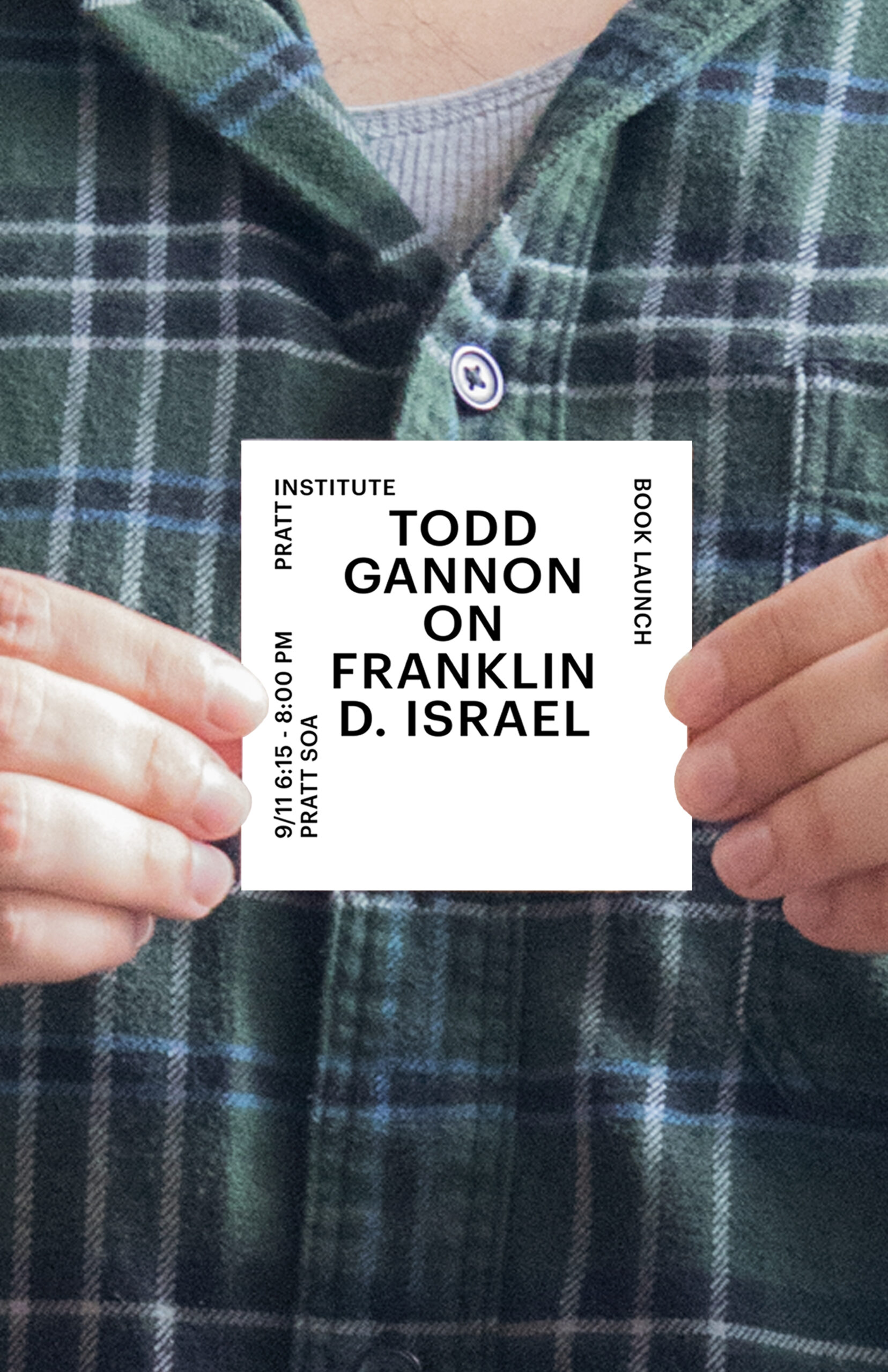 Close-up of a person holding a small printed poster for the “Todd Gannon on Franklin D. Israel” book launch event at Pratt Institute. The poster features minimalist typography over a white background, with event details listed along the edges.