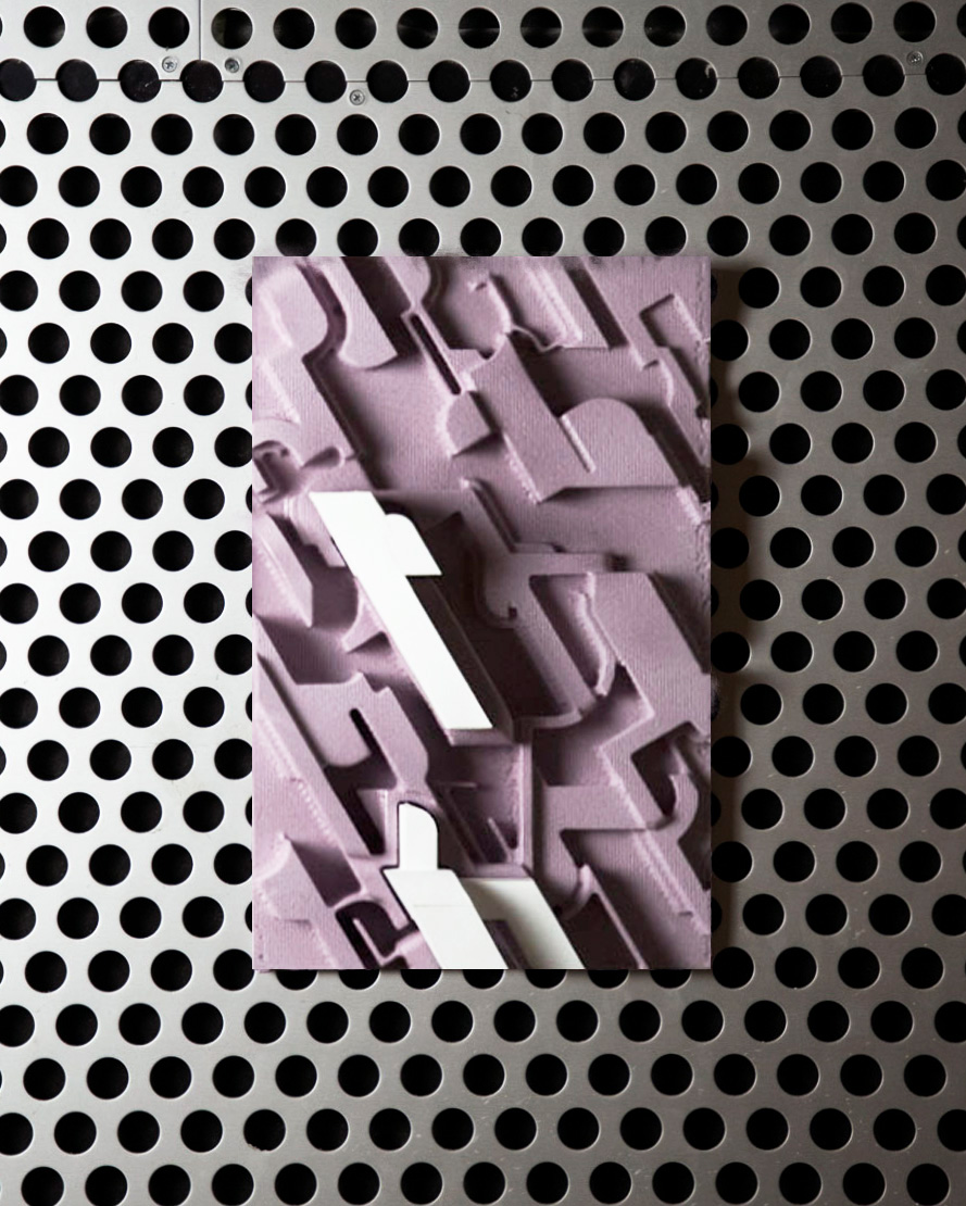 A textured artwork featuring a pattern of interlocking shapes in varying shades of purple and white. It is mounted on a background of perforated metal with evenly spaced circular holes. The artwork's design includes sharp angles and geometric forms, creating a dynamic visual effect against the contrasting background.