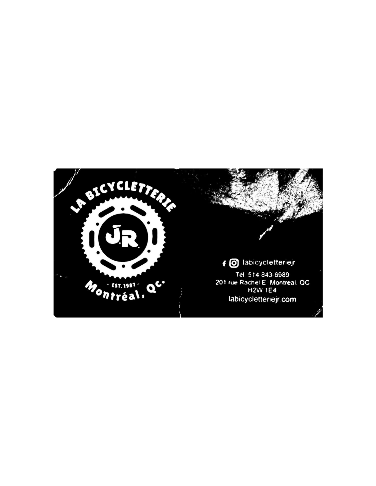 Business card design featuring a circular logo with the text "JR" and "LA BICYCLETTERRIE" above it. The card includes contact information: Instagram handle, phone number (514-843-6989), address (201 rue Rachel E, Montreal, QC, H2W 1E4), and website (labicycletteriejr.com). The overall background is black with white text and logo.