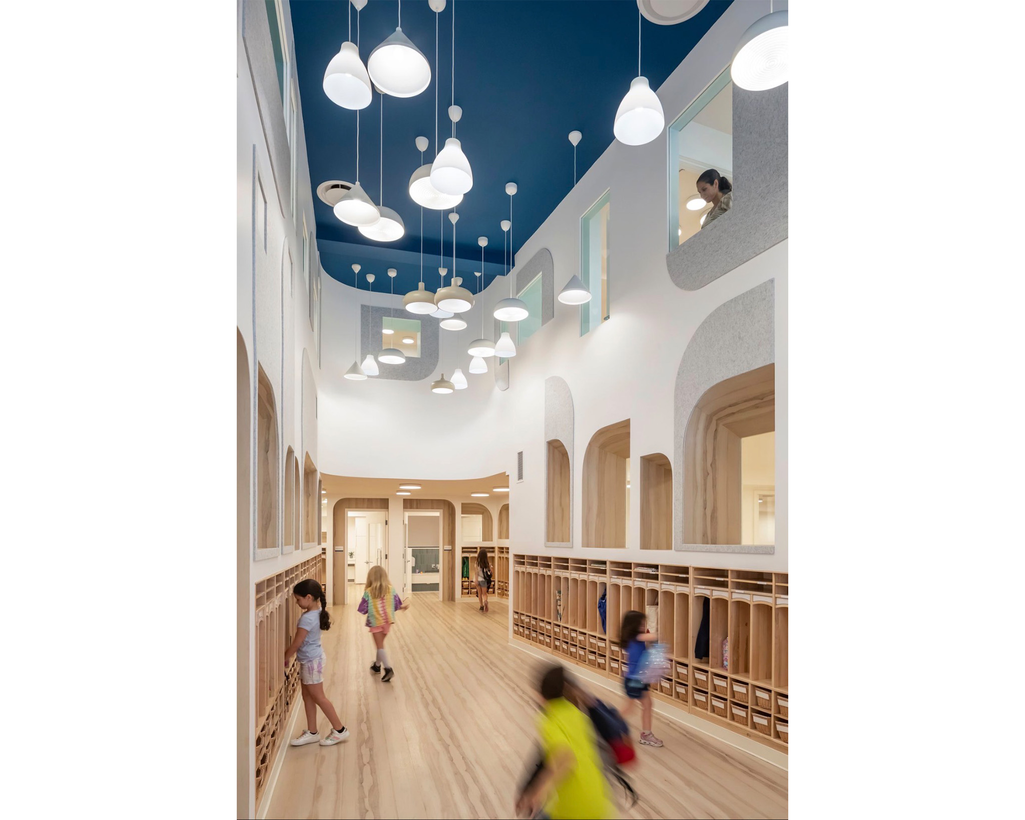 A double-height circulation space in a preschool.