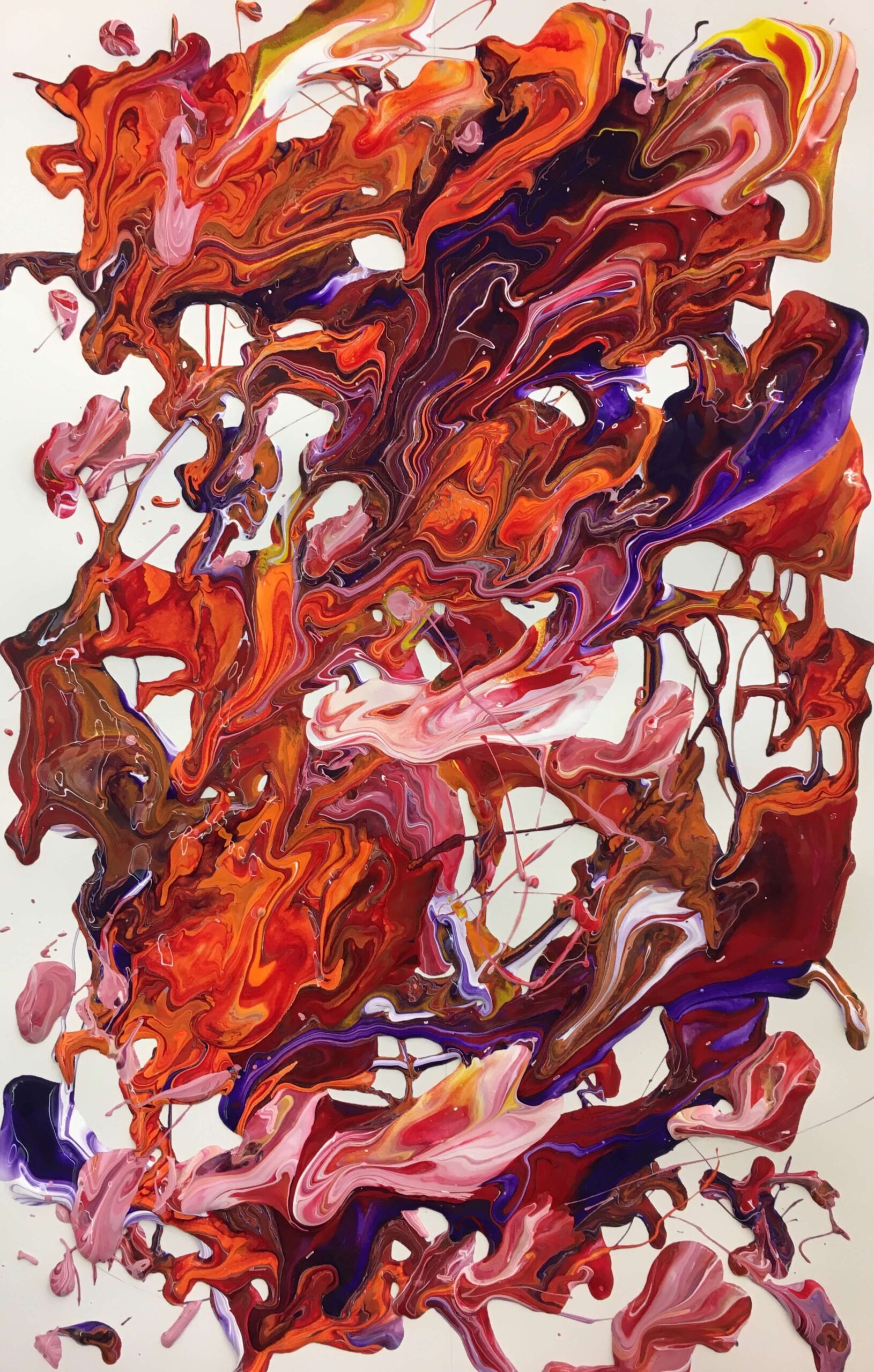 An abstract Illustration resembling paint blotches of red, pink, purple and orange hues.