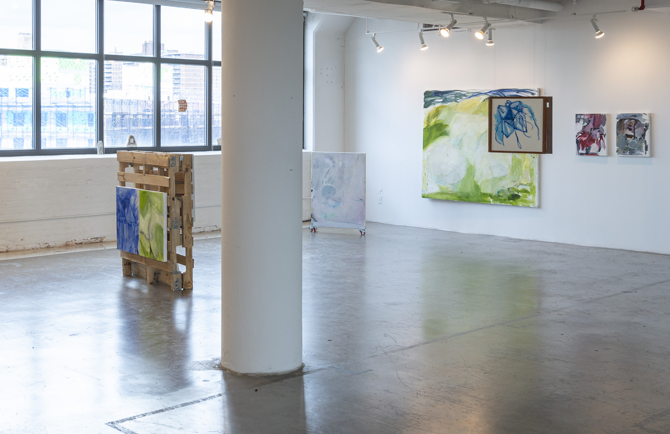 large gallery room, with painting and tapestry