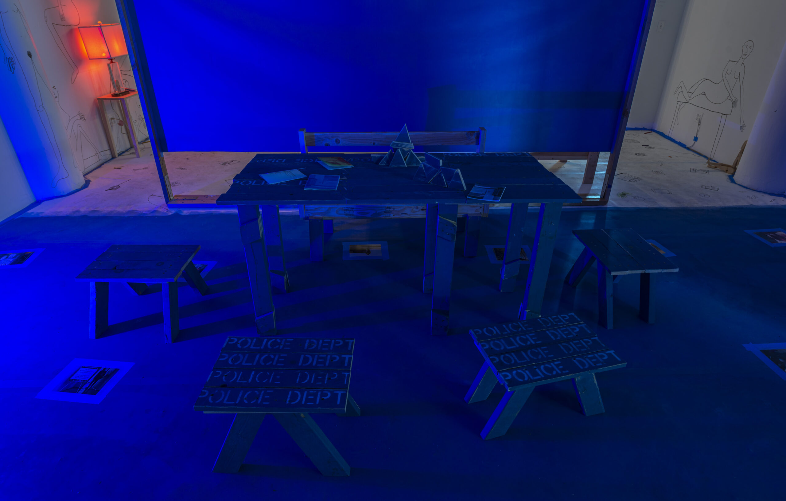 installation room, lit with deep blue light