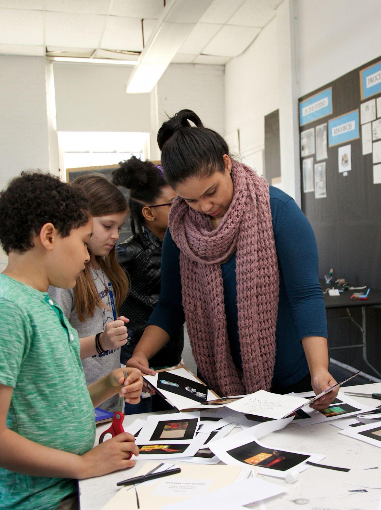 A student-teacher in Saturday Art School preparing for Open Studios.