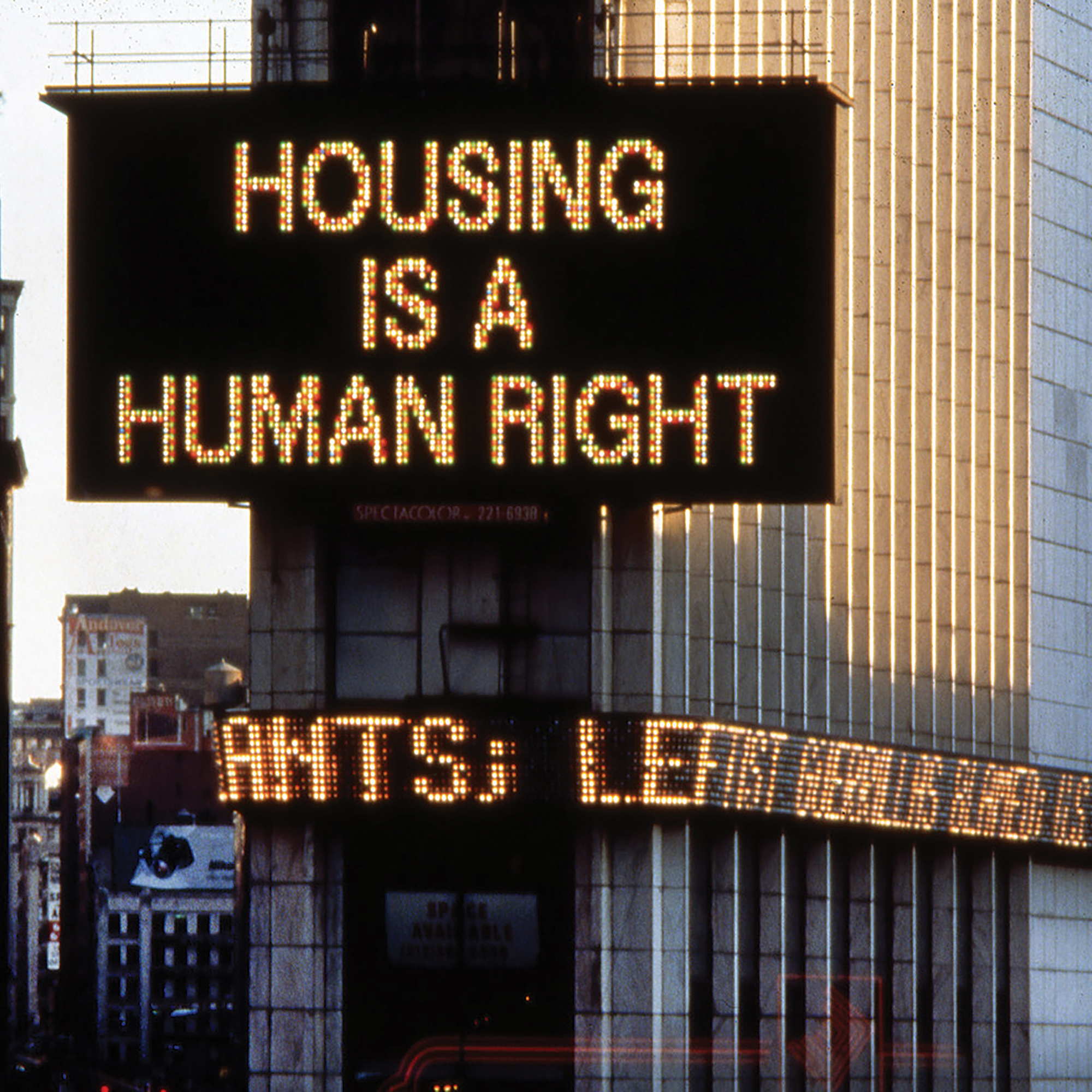Installation image of Housing is a Human Right (March 1989) in Times Square: Martha Rosler. Housing is a Human Right, March 1989. Times Square Specatcolor signboard animation, 1:10 min. Public Art Fund, New York. © Martha Rosler