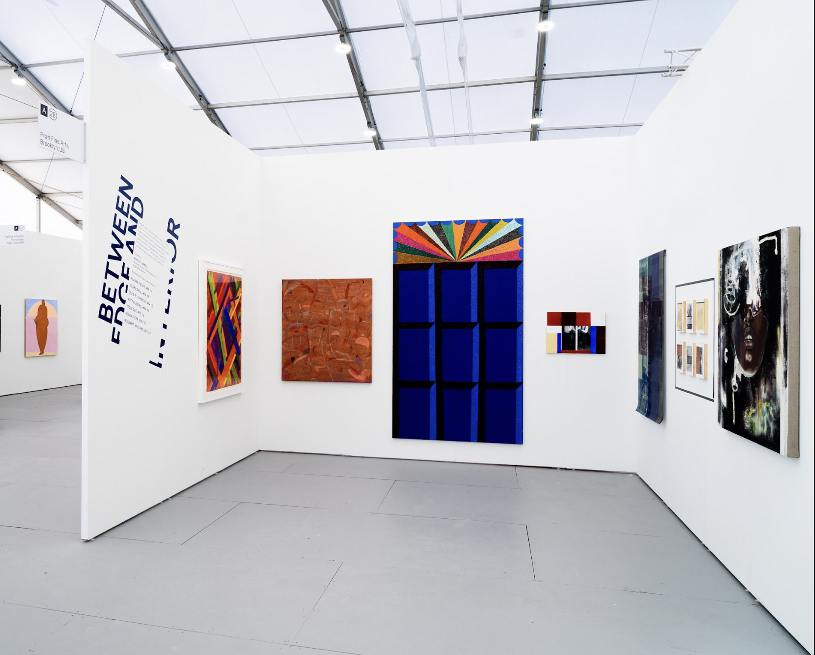 art gallery with visual pieces hanging on the walls