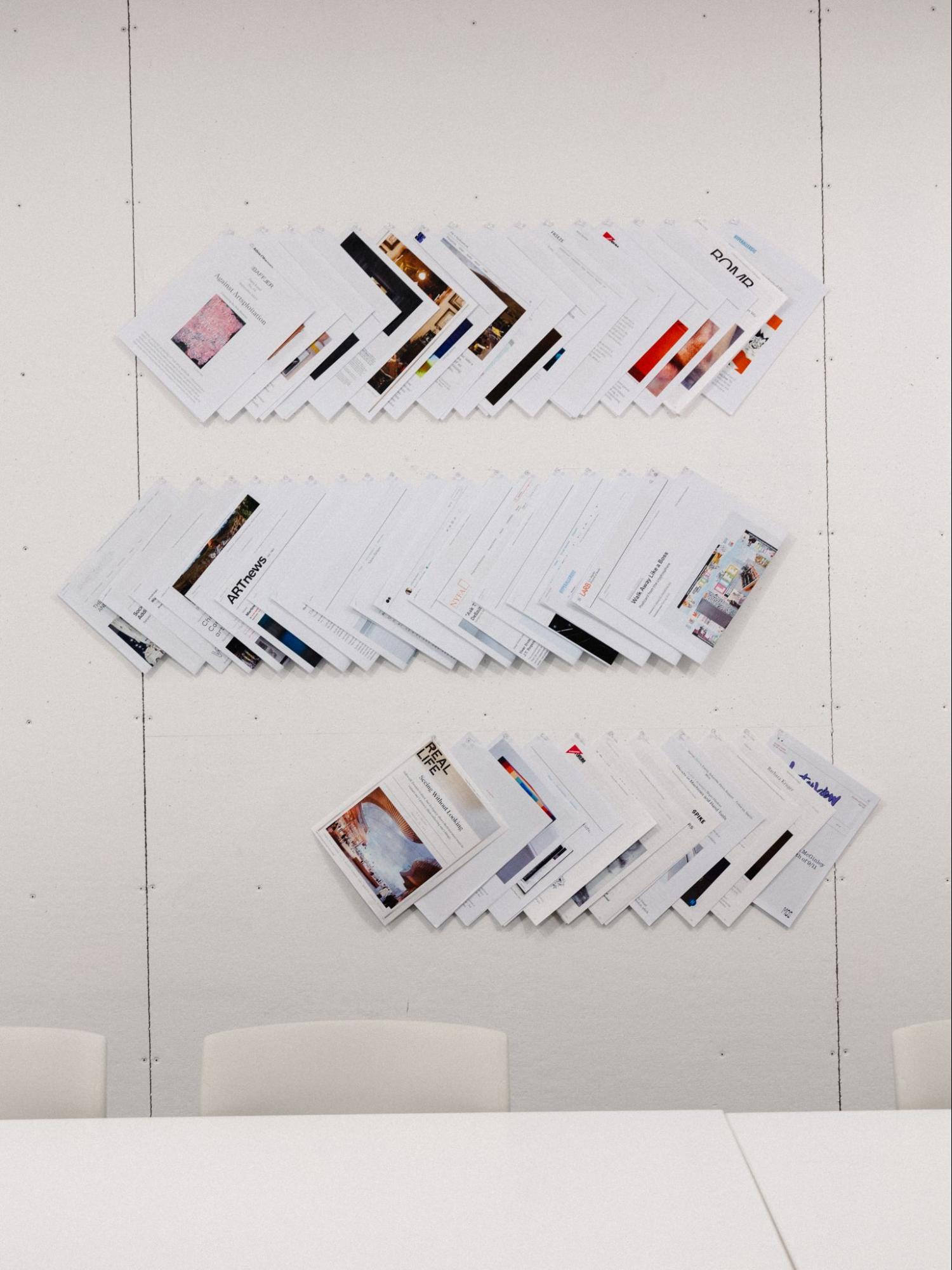 assorted works arranged in rows