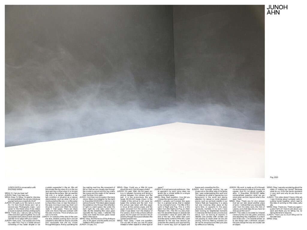 A photo of the corner of a room with a white floor and a grey wall. The floor appears to have an incandescent glow