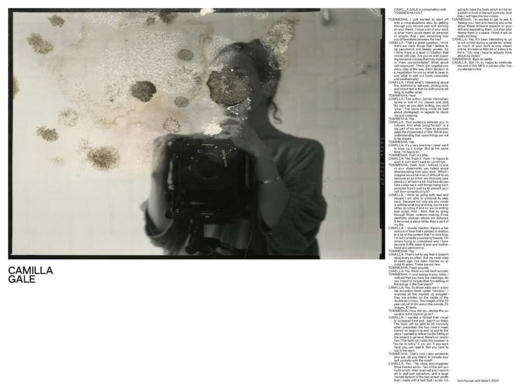 Photo of woman with a warped face holding a large box. She appears to be underwater and there are floating, yellow balls near her.