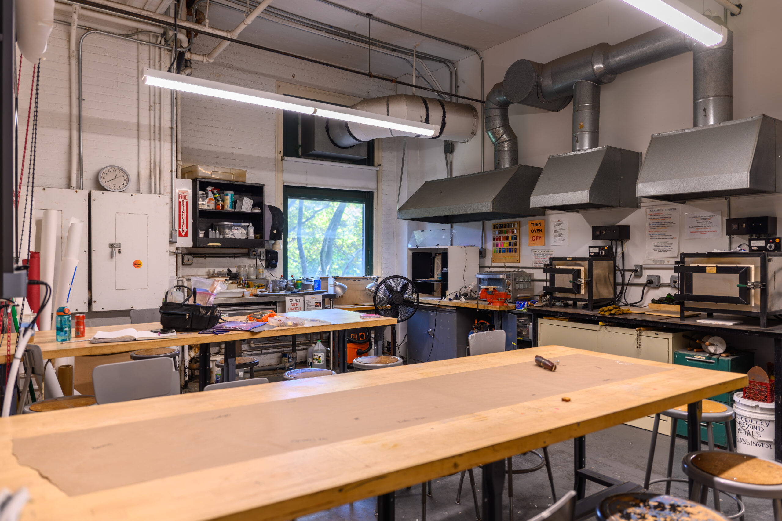 Fine Arts Jewelry shop showing tables, furnaces, and vent hoods
