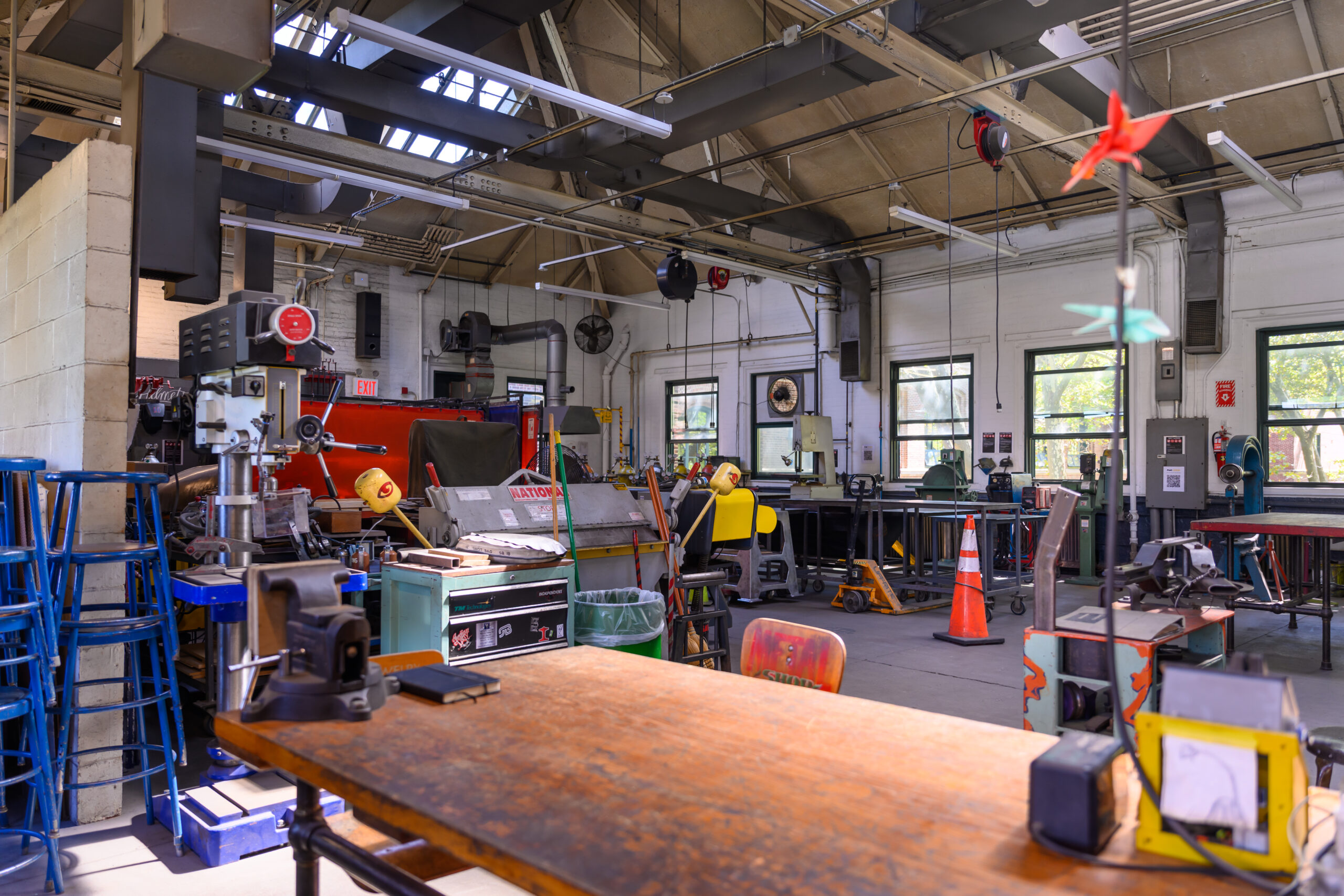 Fine Arts metal shop: an open, large room with equipment throughout