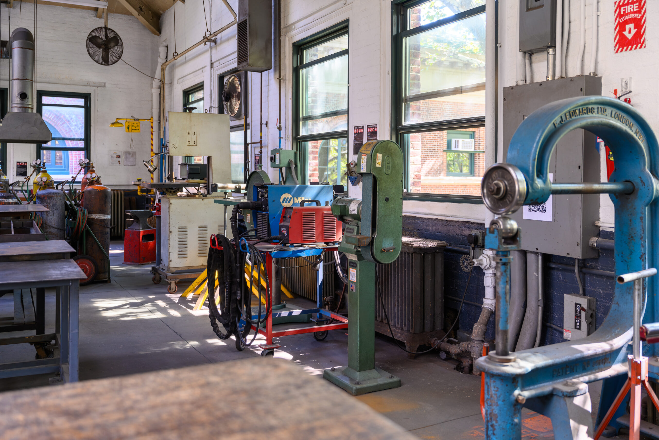 Fine Arts metal shop: an open, large room with equipment throughout