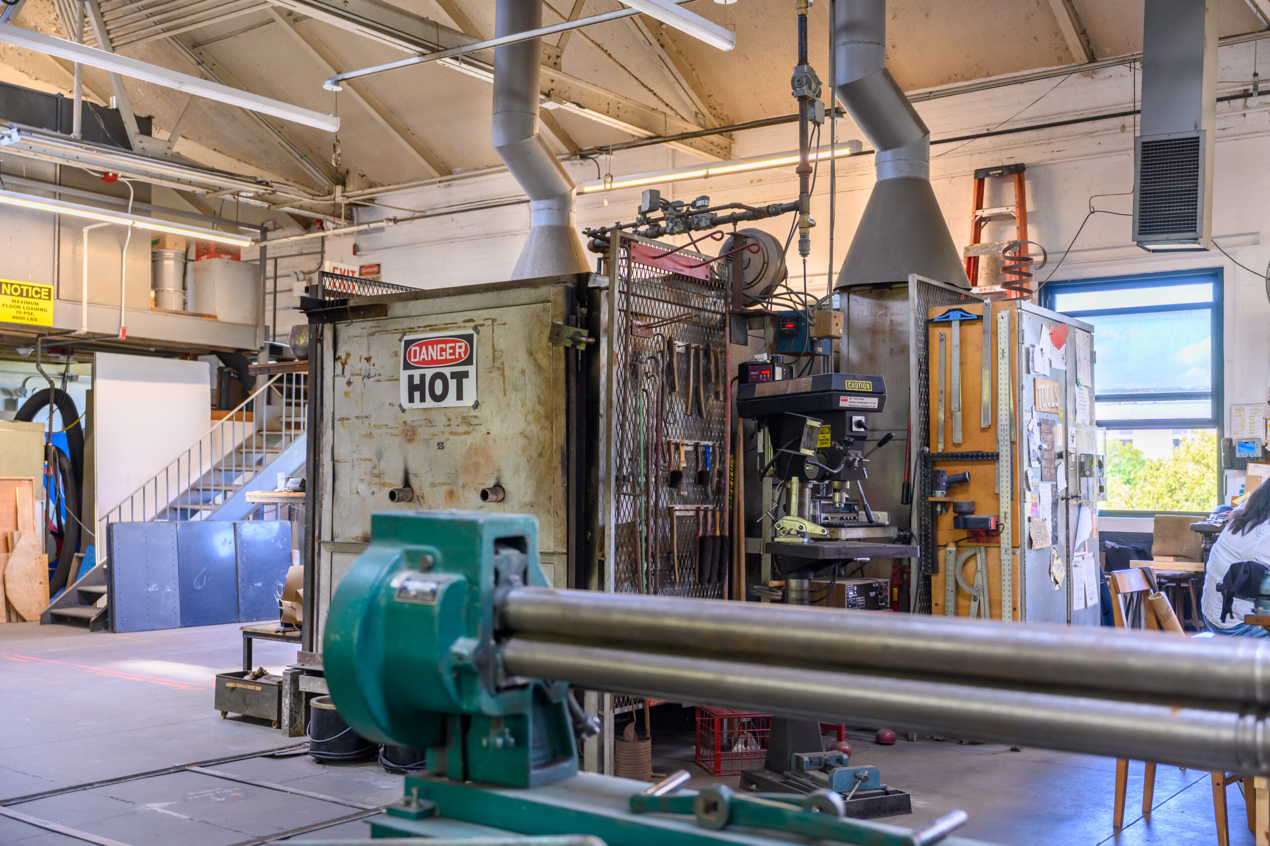 Fine Arts metal shop: an open, large room with equipment throughout