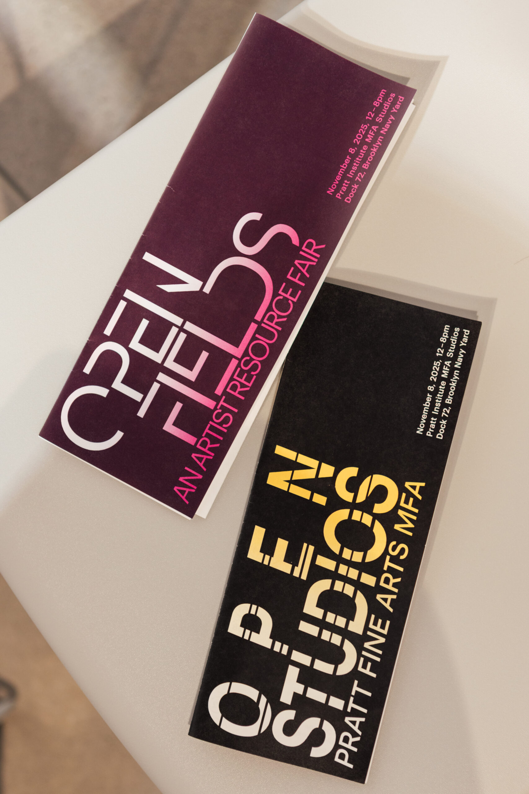 An Open Fields brochure next to an Open Studios brochure for 11/8/2025 Open Studios / Open Fields event hosted by Pratt Fine Arts. The Open Fields brochure has a medium to light gradient 