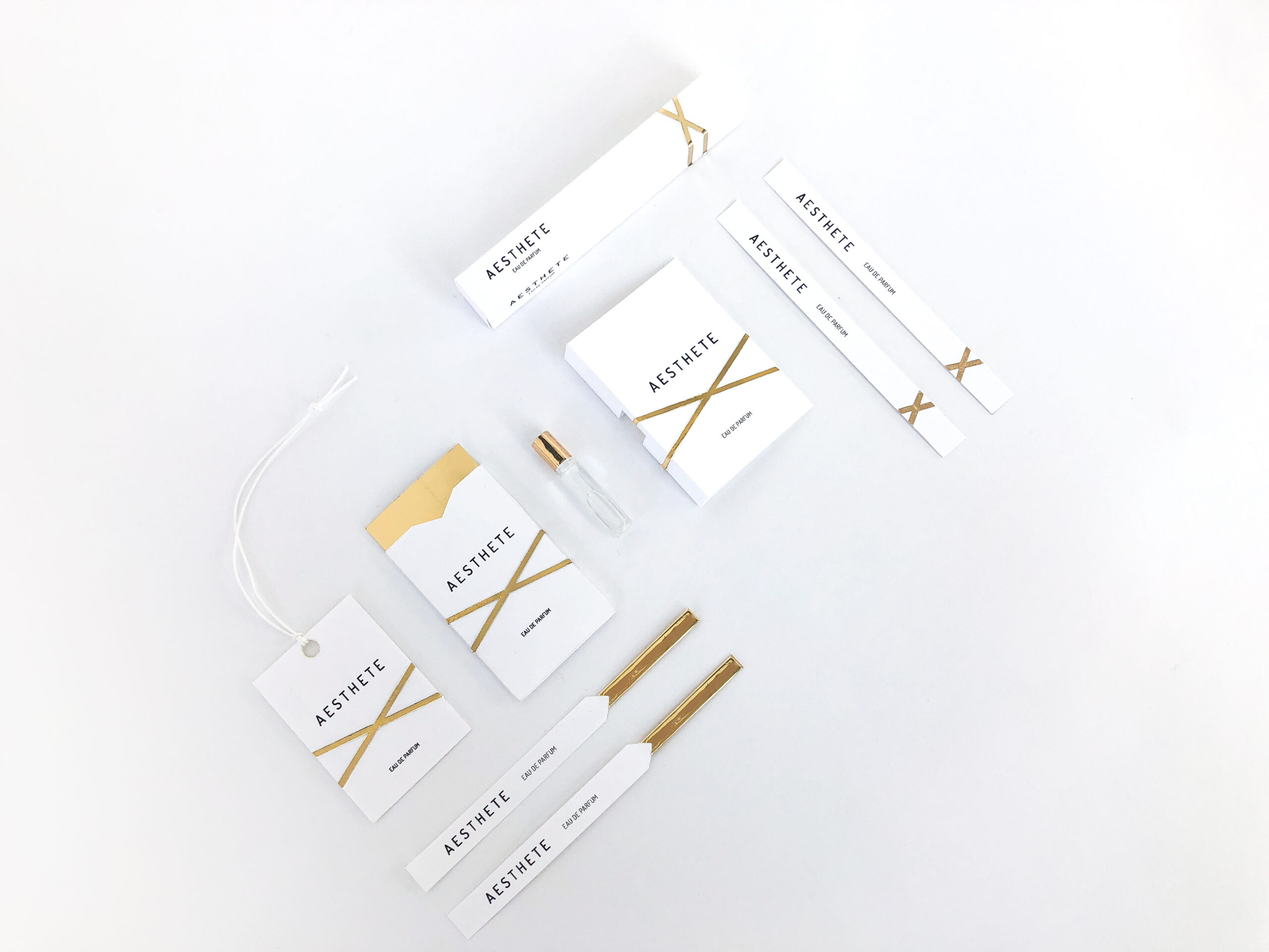 multiple packaging designs, from boxes to applicators of a proposed perfume line called 