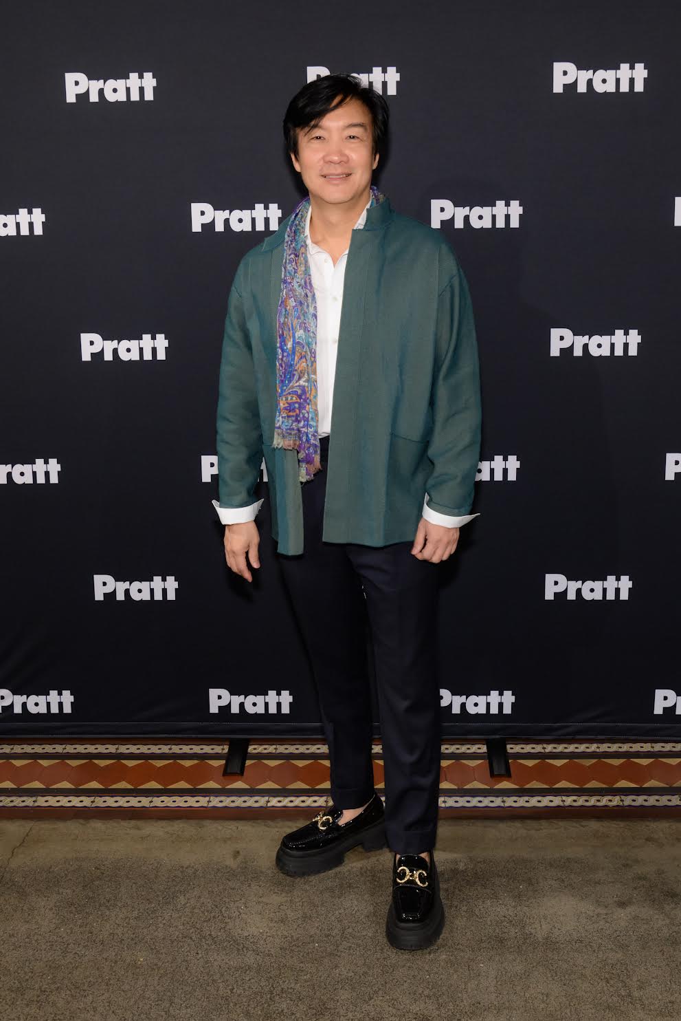 color photograph of a man in designer clothes at a Pratt event