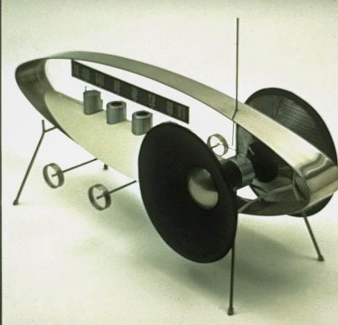 a color photograph of an oval-shaped, space-age stereo