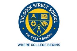 A circular logo featuring a blue border with the text "THE DOCK STREET SCHOOL For STEAM Studies" at the top and "WHERE COLLEGE BEGINS" at the bottom. Inside the circle is a shield divided into four sections, depicting a laboratory flask, a gear, a paint palette, and a compass, representing science, technology, engineering, arts, and mathematics (STEAM). The background is yellow.