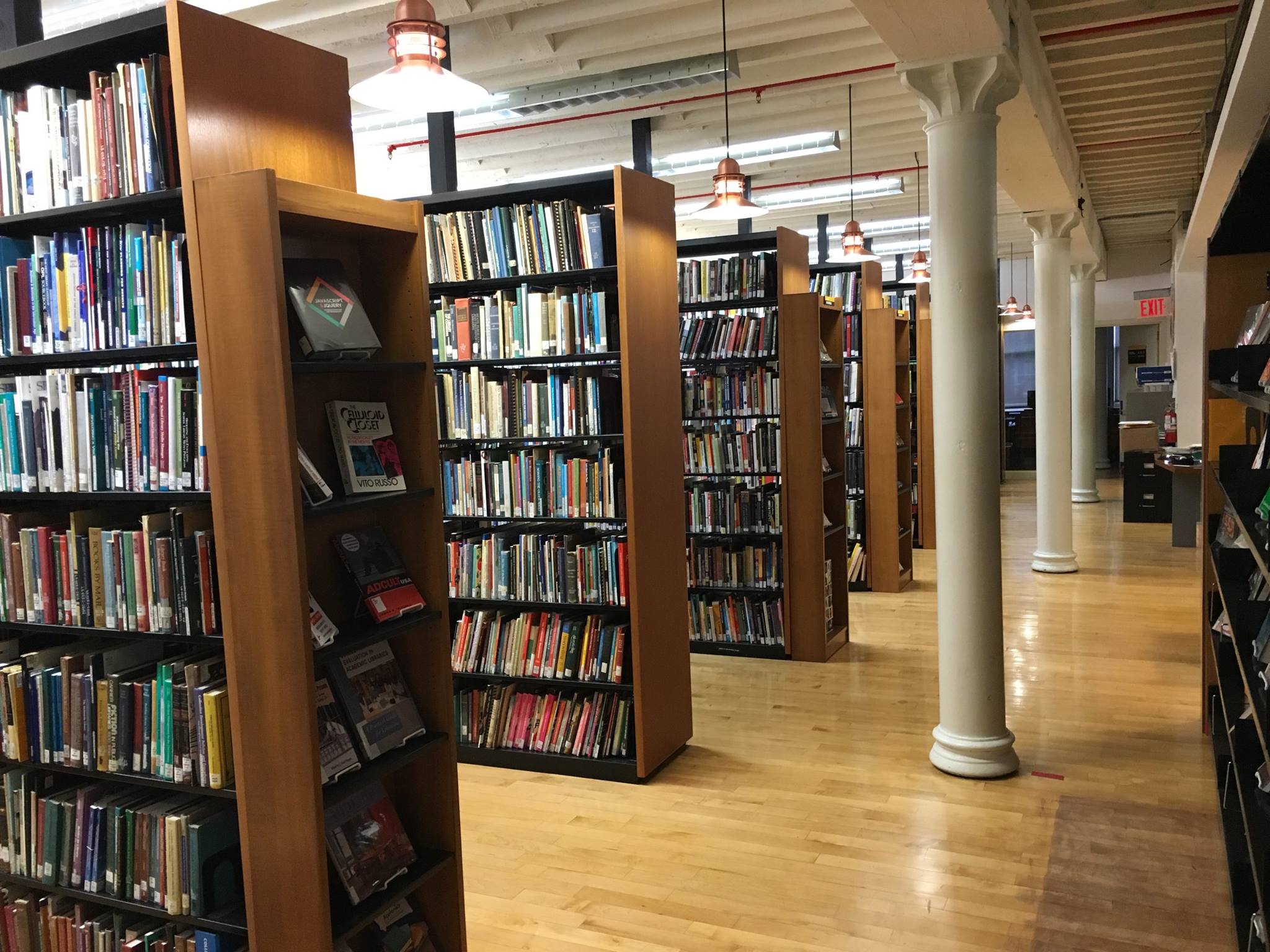 A photo of stacks of books on the fourth floor library.
