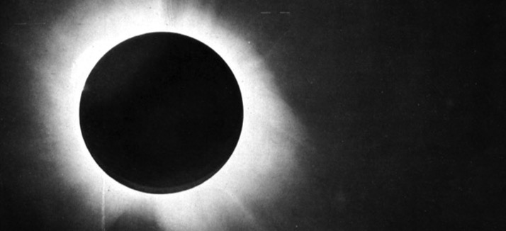 a solar eclipse in black and white