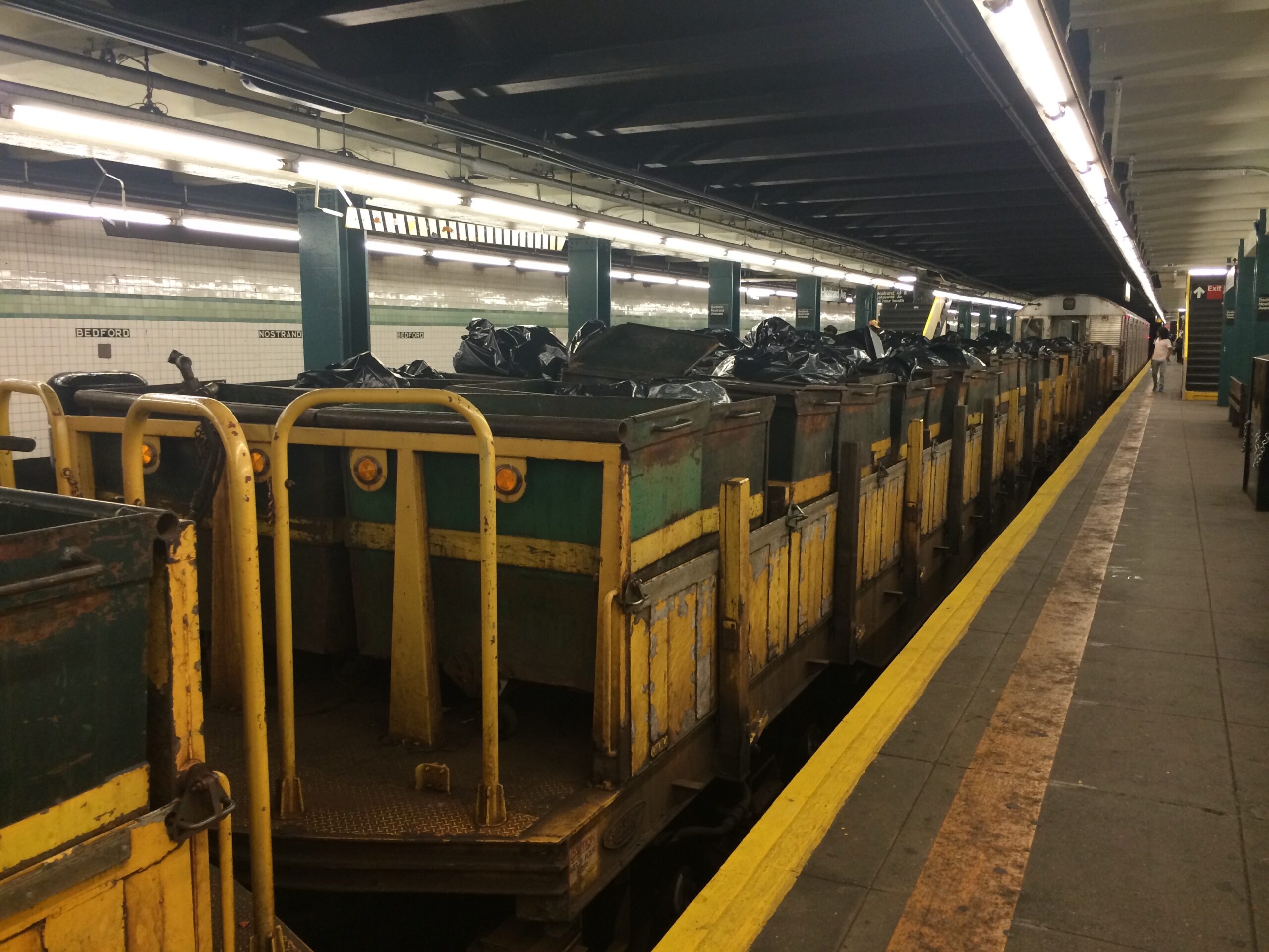 Train cars loaded with bags of waste collected in New York City's subway system.