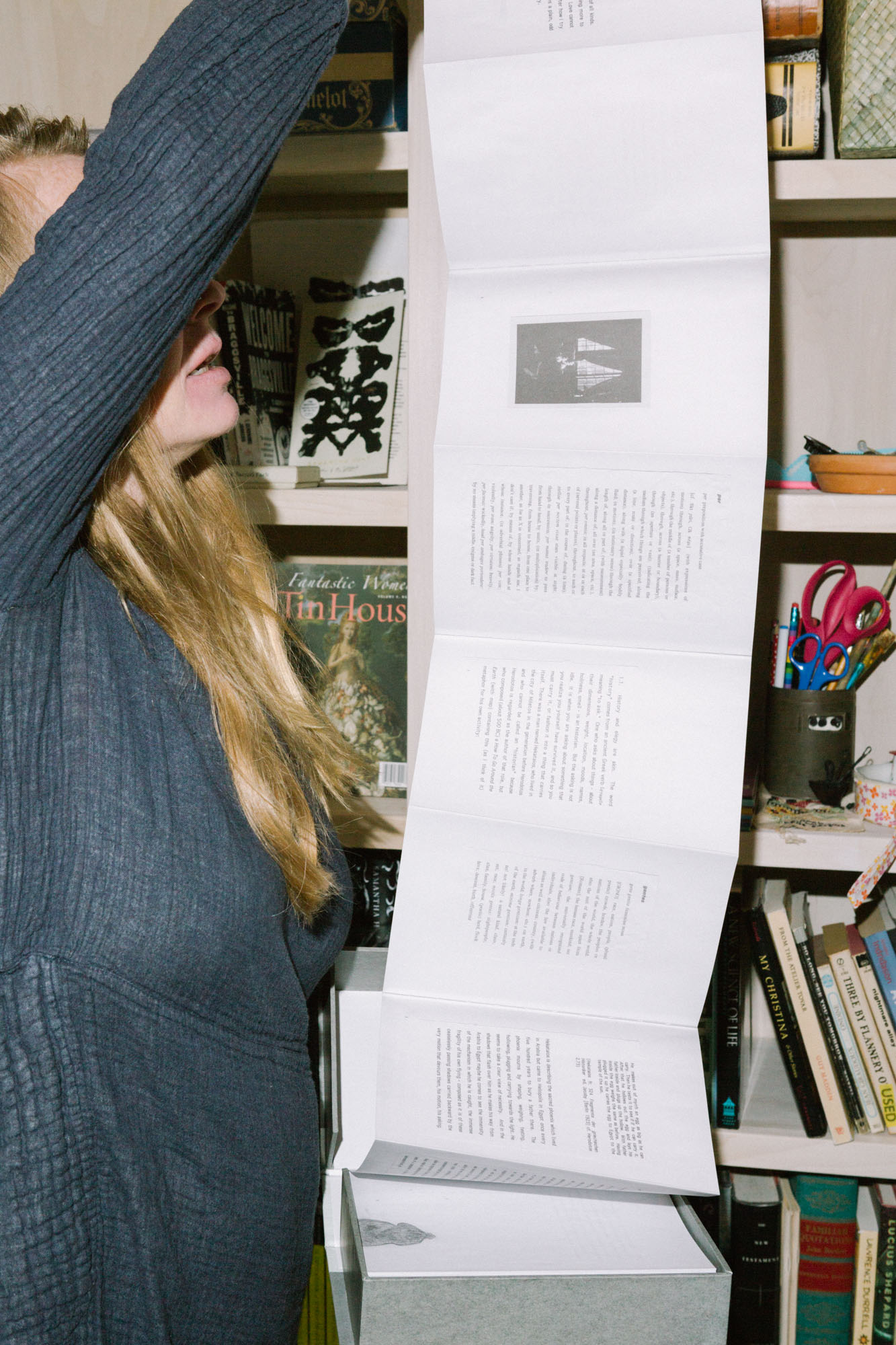 Samantha Hunt unfurls an accordion book with words and black-and-white pictures