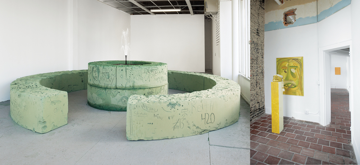 Circular fountain sculpture of green foam with scratches and etchings and hallway with sculpture on a yellow pillar