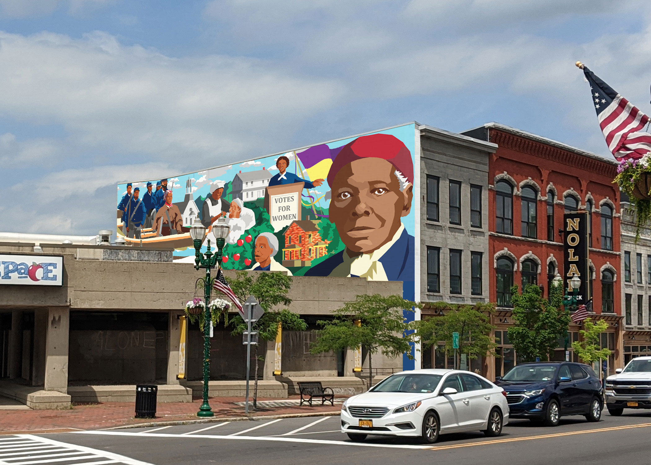 A painted mural depicting Harriet Tubman on the end facade of a block of townhouses on a tree-lined street.