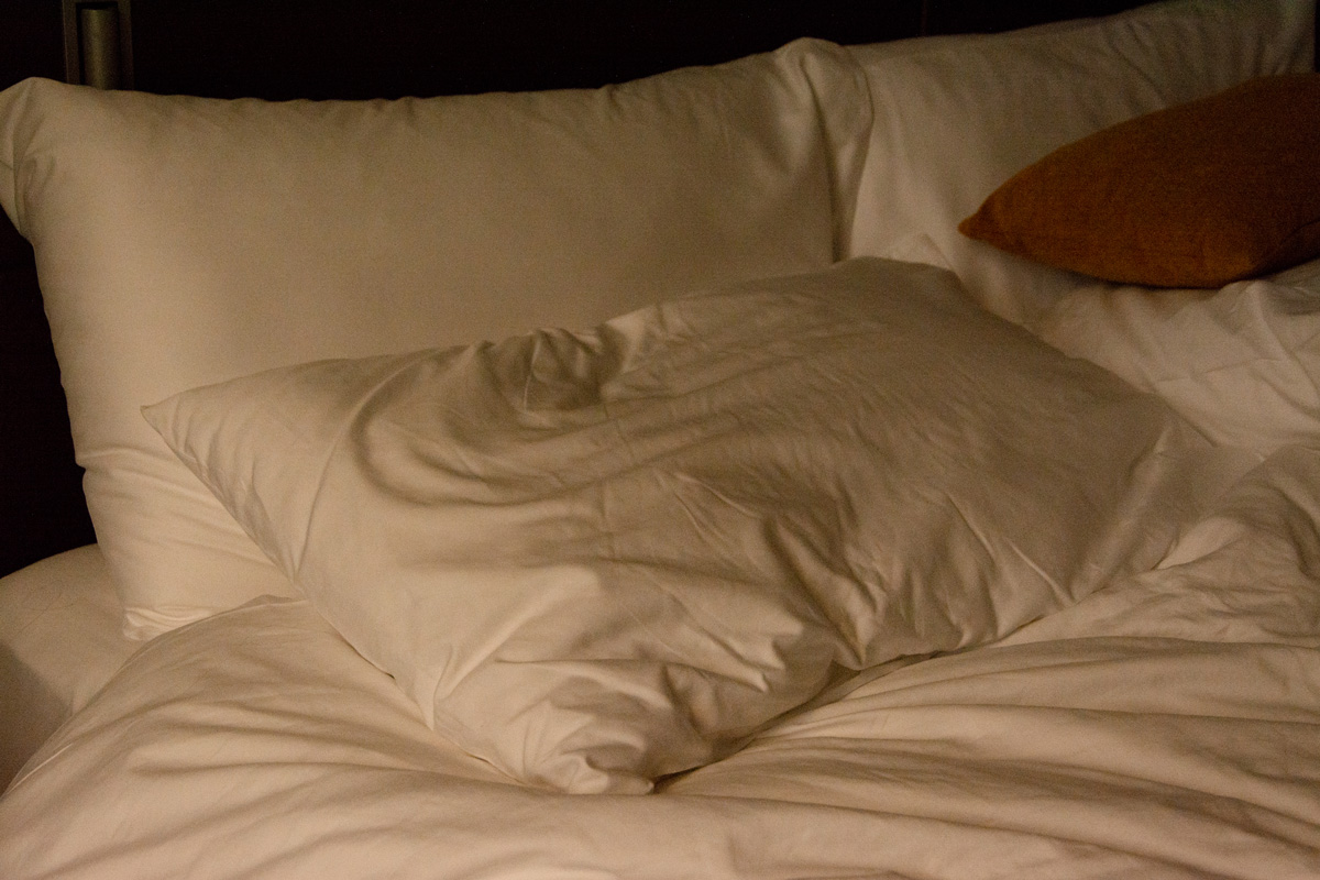 Picture of white pillows on a bed