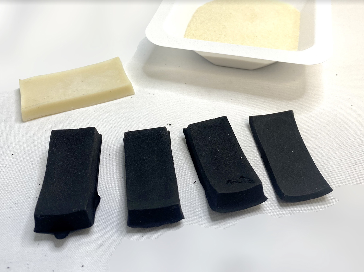 “Bioplastics: Materials for a Sustainable Future” by Professor of Math and Science Cindie Kehlet and Helio Takai, interim dean of SLAS, with Math and Science Lab Technician Mary Lempres