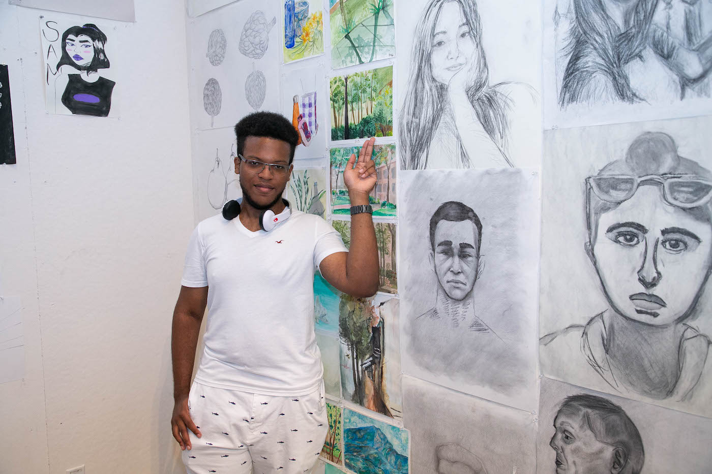 BAP Scholar Jeremy Broomes with his work (photo by Sam Stuart)