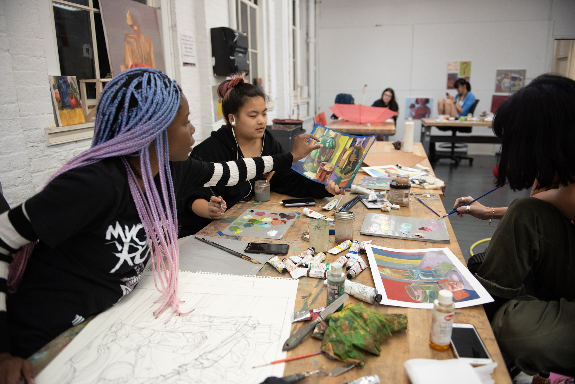 Picture of students working together on an art project