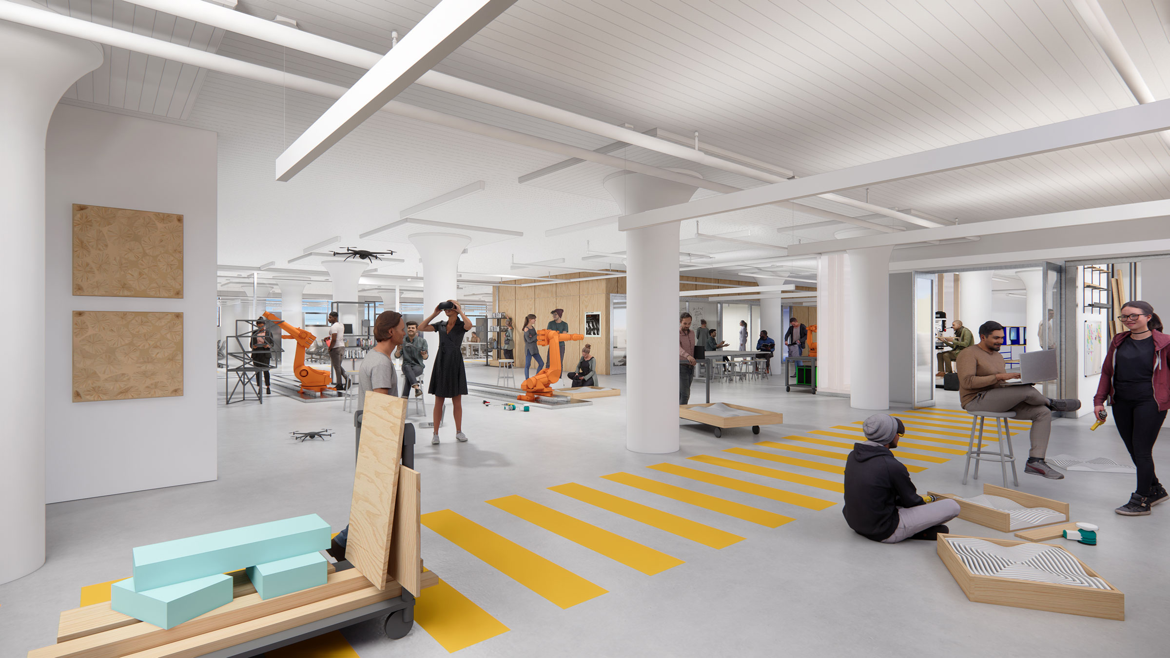 Students work and collaborate in an expansive, brightly lit facility