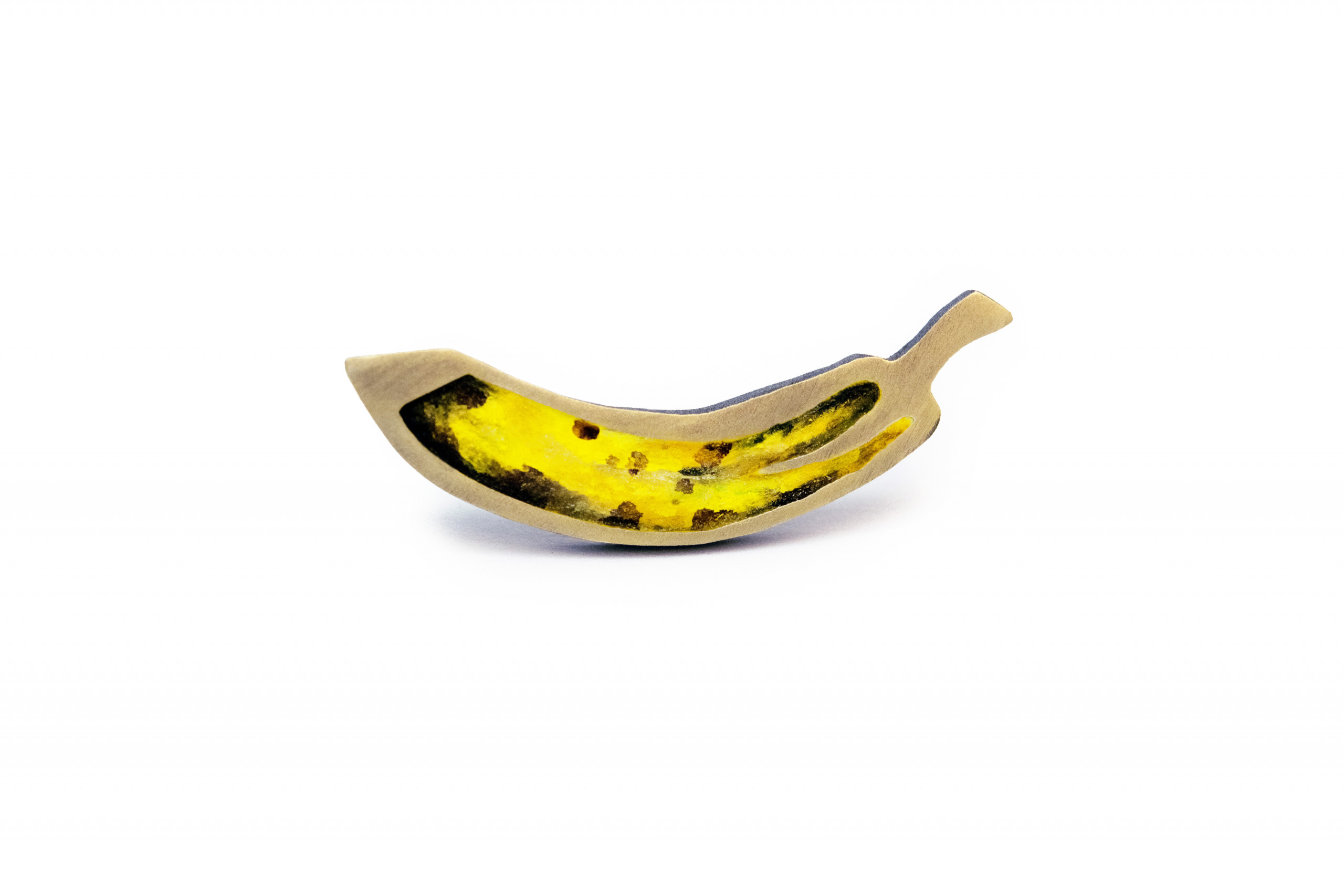 Jewelry piece resembling a ripe banana
