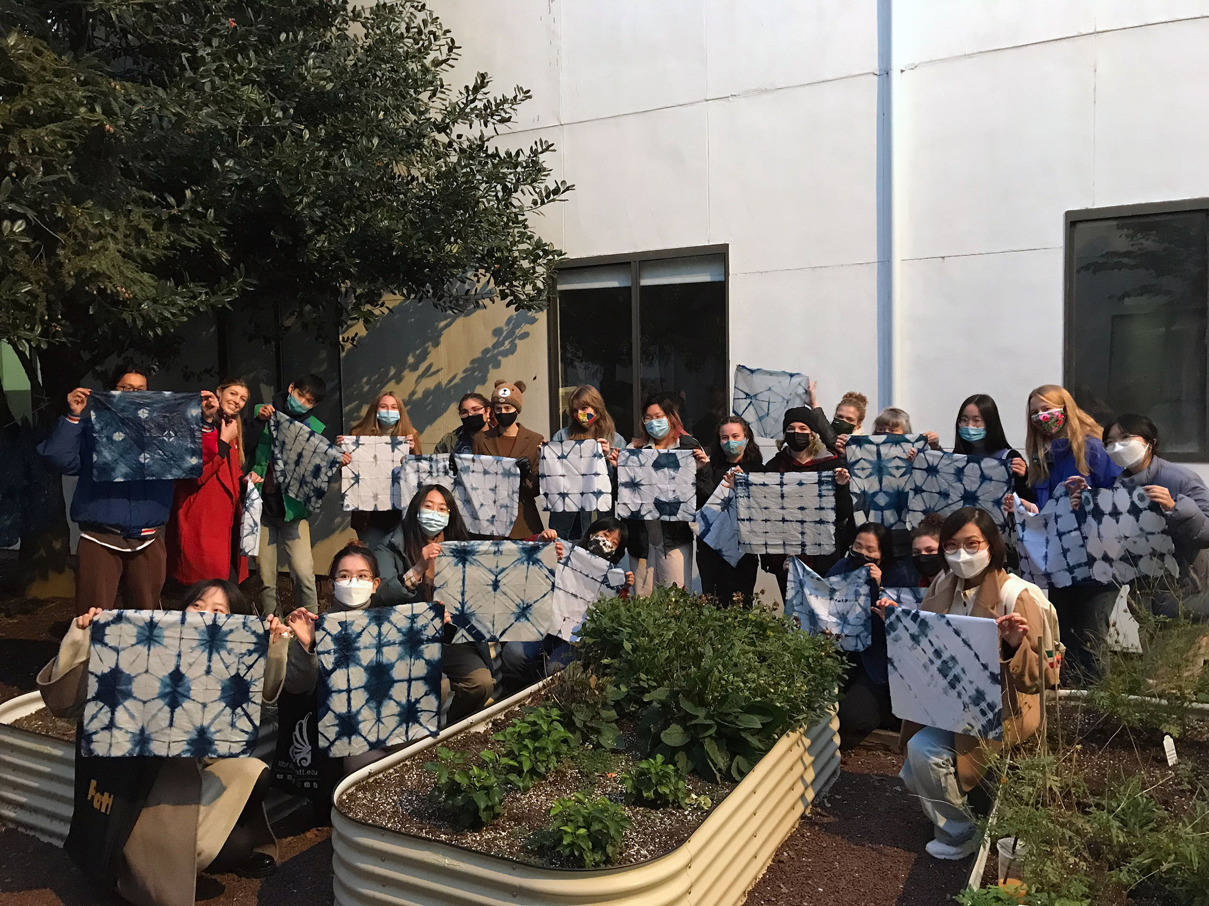 Participants in the indigo dye workshop at the Textile Dye Garden
