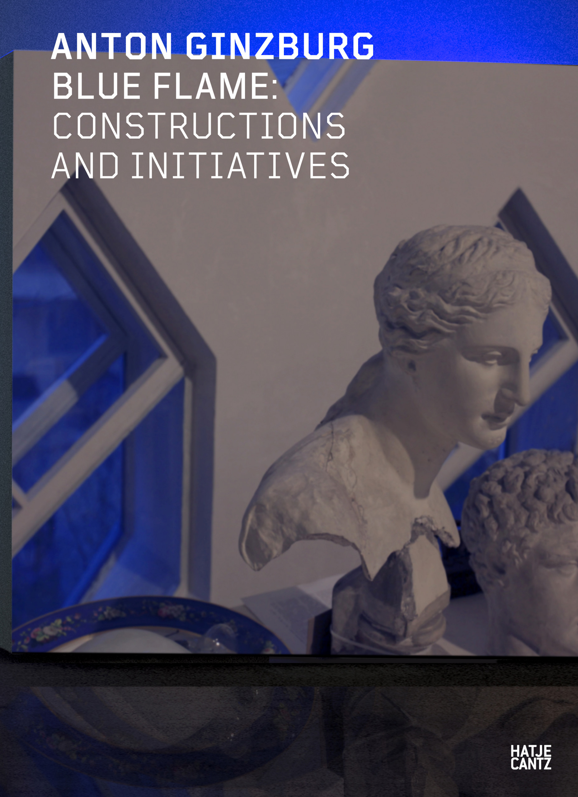 Book cover with artwork featuring marble busts against a cool blue background