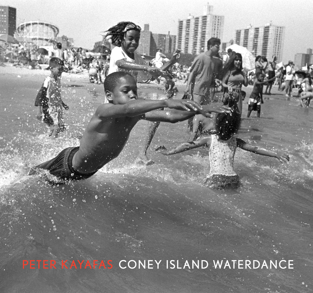 Book cover with photo of children leaping and splashing in the ocean at Coney Island