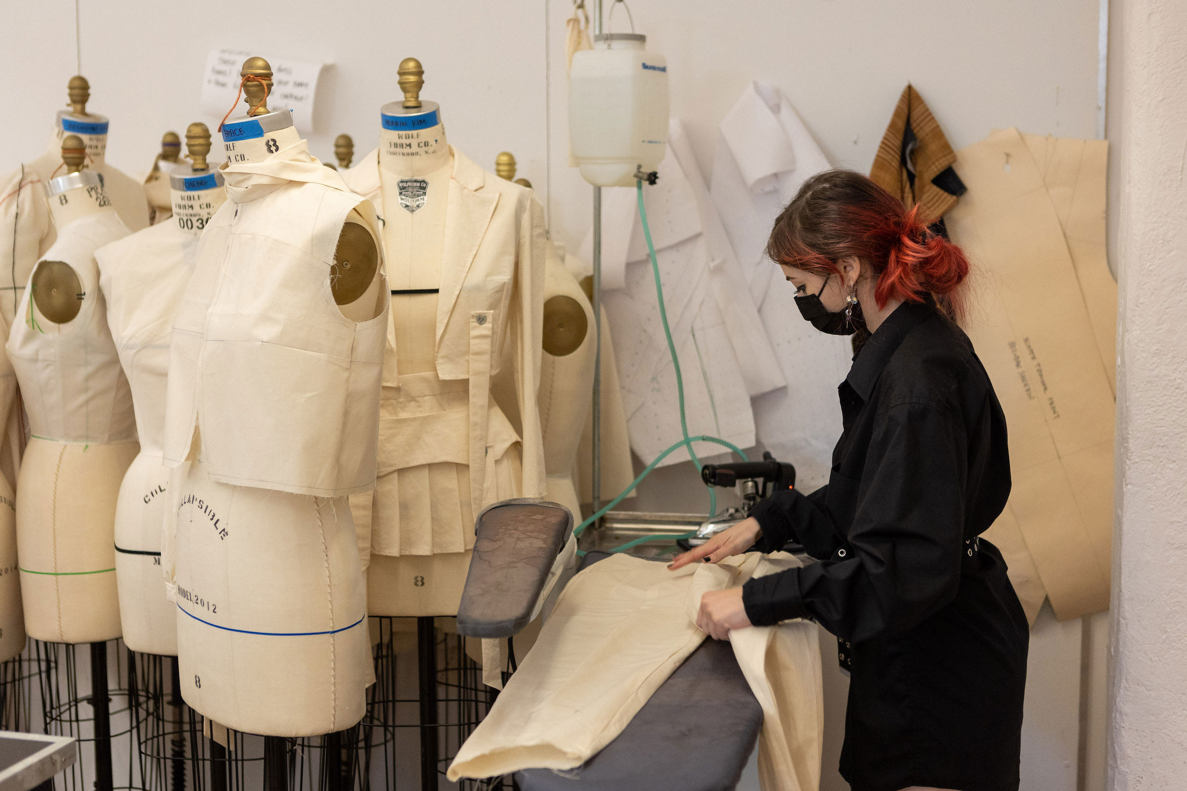 Student working on drapery and construction in 2021