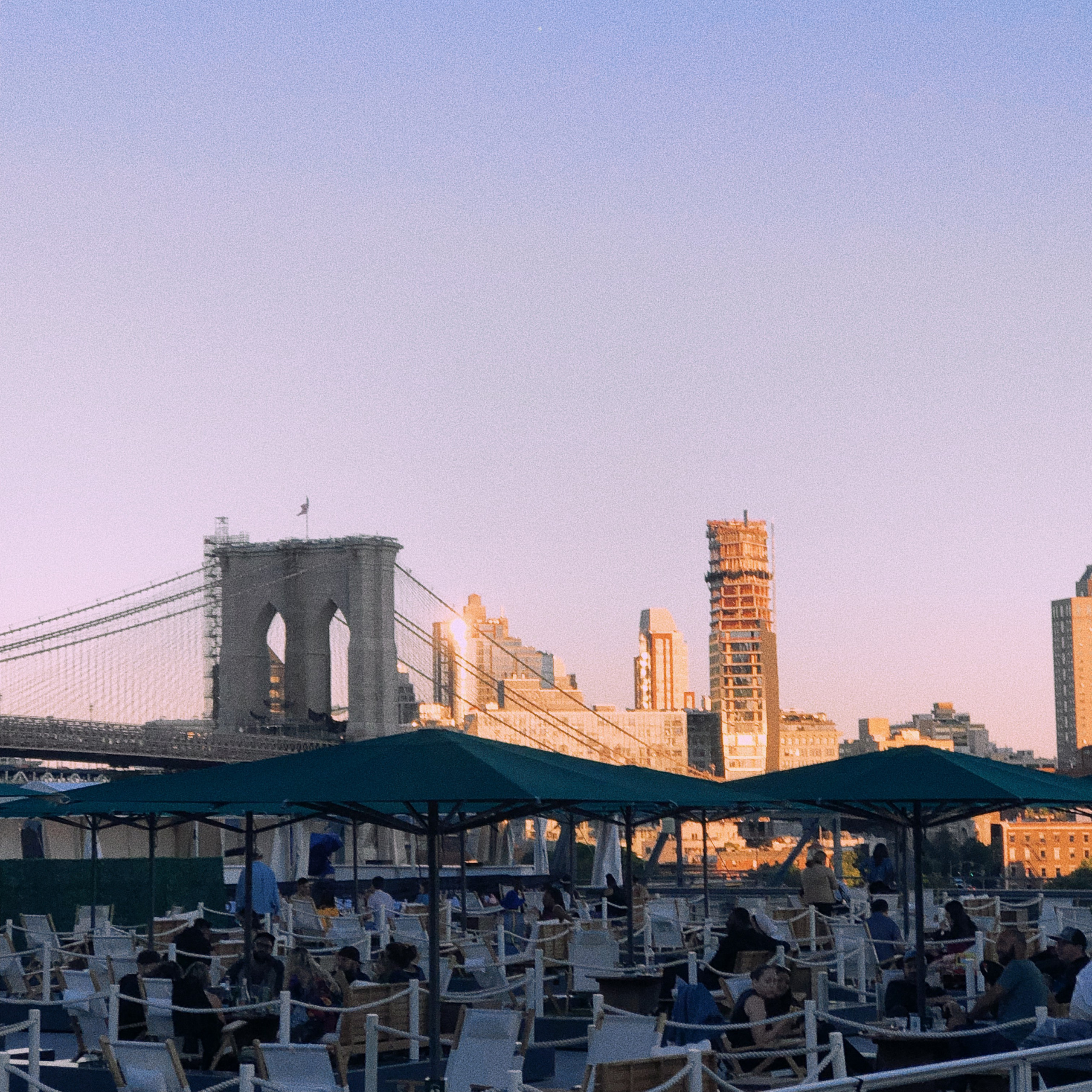 Brooklyn Bridge under azure sky