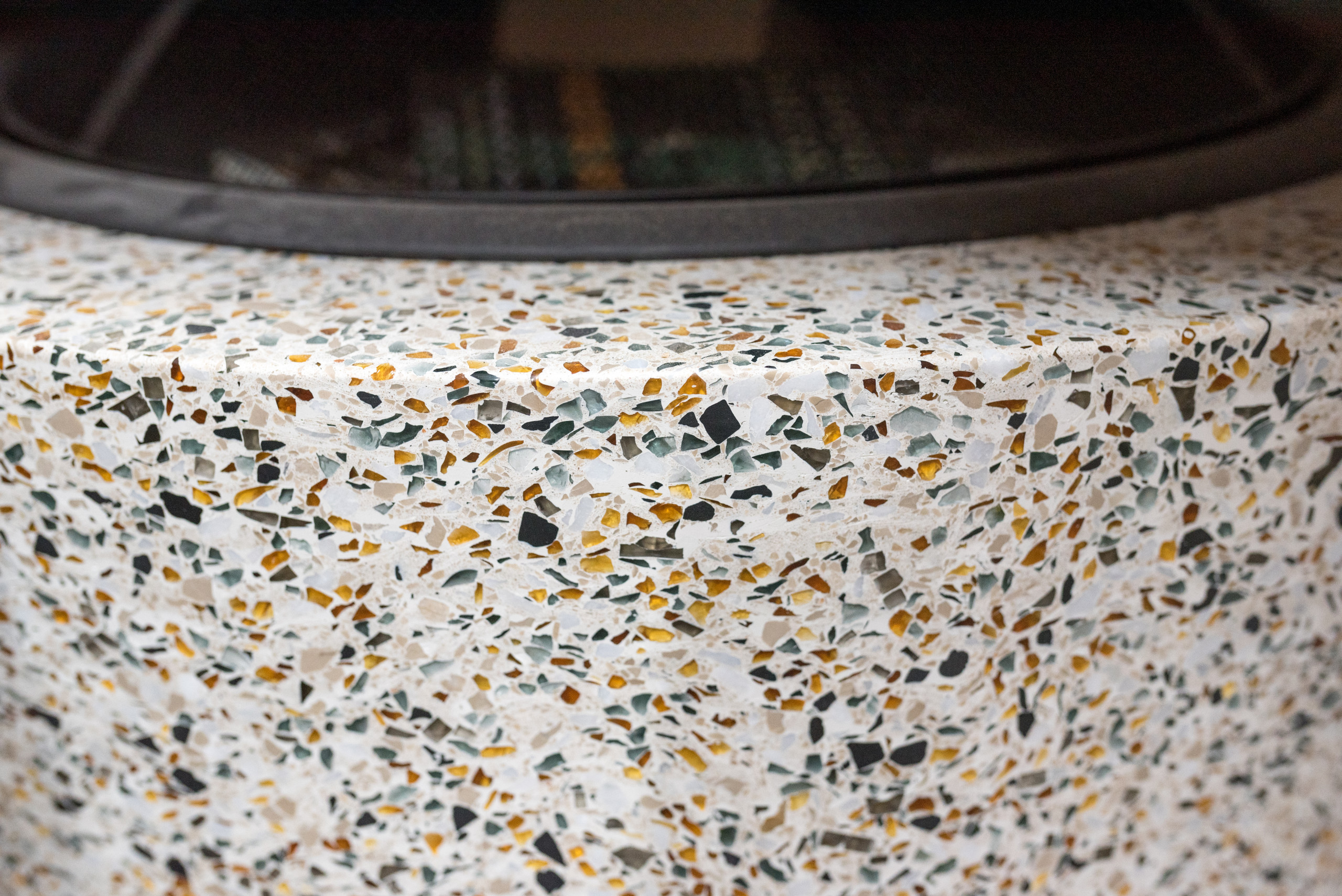 Cement with chips of colored glass