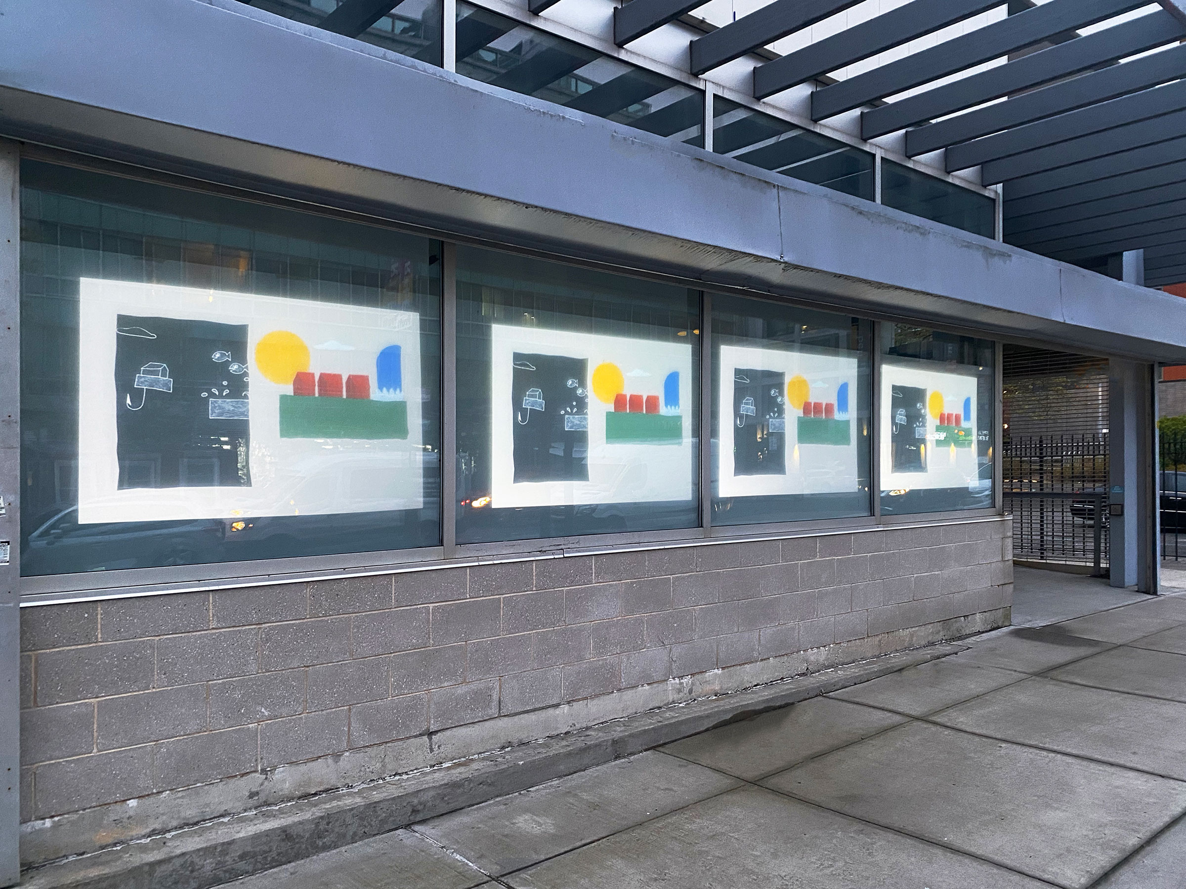“Clackamas” by Jack-Henry Lee, BFA Digital Arts (2D Animation) ’24, in the Film/Video Building windows (photo by Andrea Merkx)