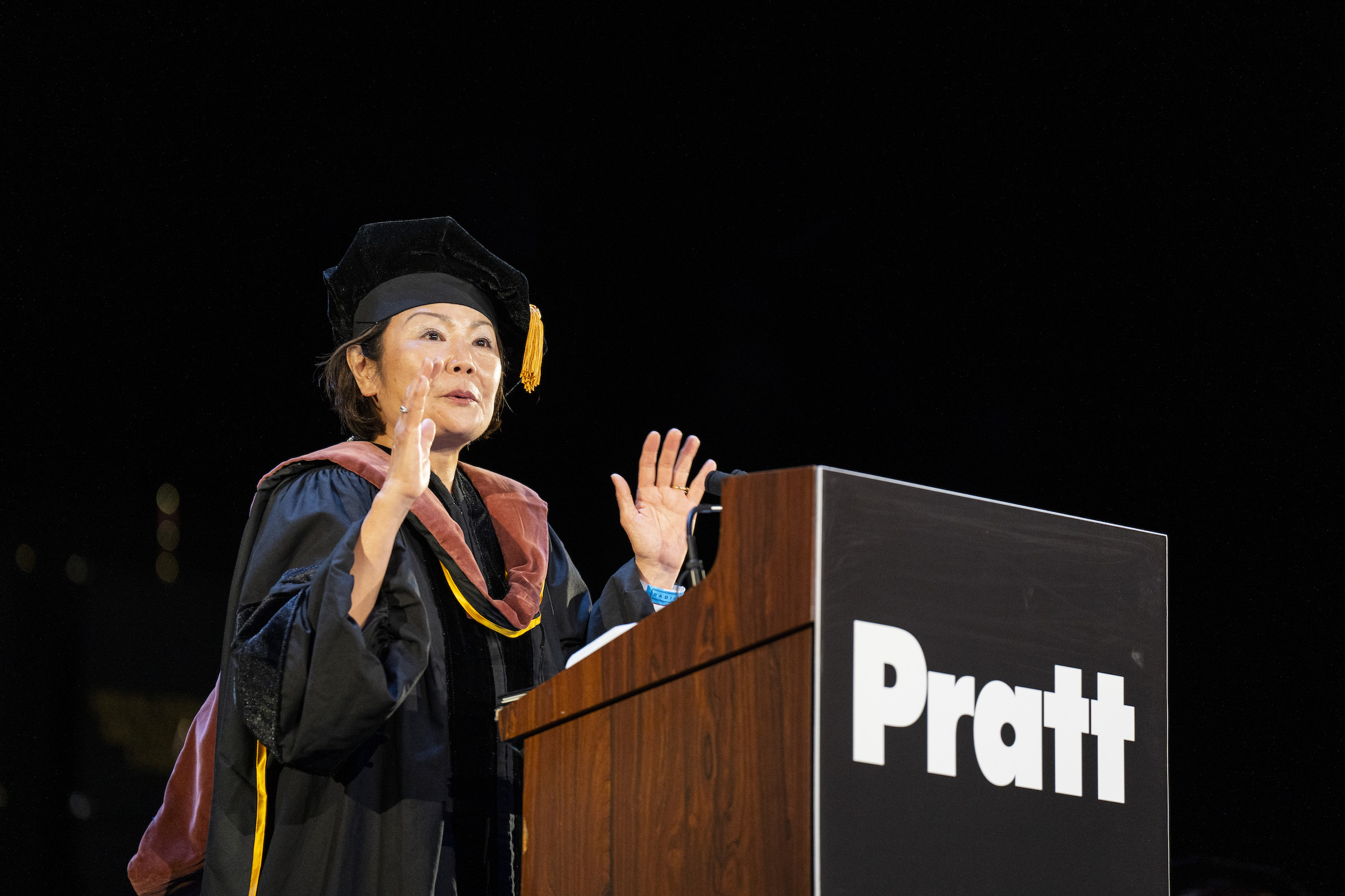 Toshiko Mori giving the Commencement address