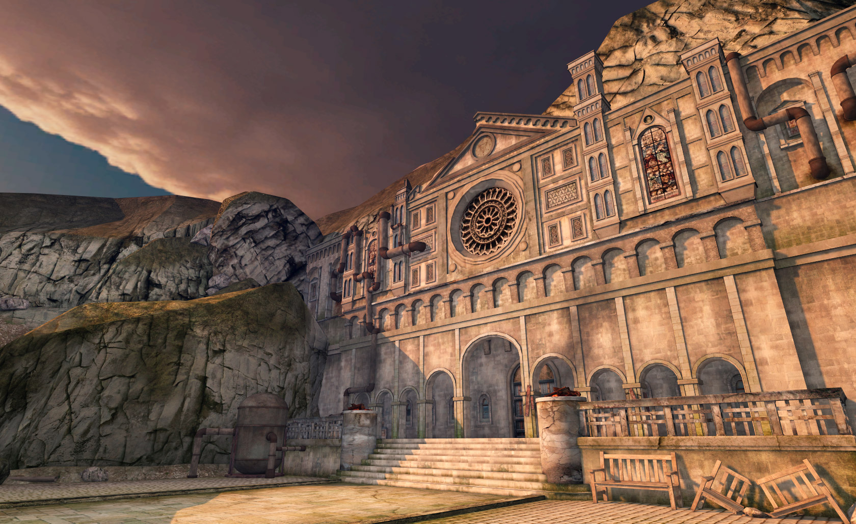 A large church-like building embedded in the side of a cliff during a sunset