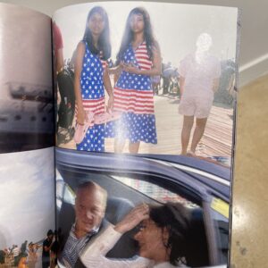 A double-page spread from a book featuring two young girls in matching red, white, and blue dresses with star patterns, standing on a boardwalk. They are holding pink shoes. In the background, crowds of people are visible on the boardwalk. Below, a close-up of a man and a woman inside a car, with the man appearing to look at the woman who is touching her hair, both engaged in conversation. On the opposite page, a blurry boat can be seen.
