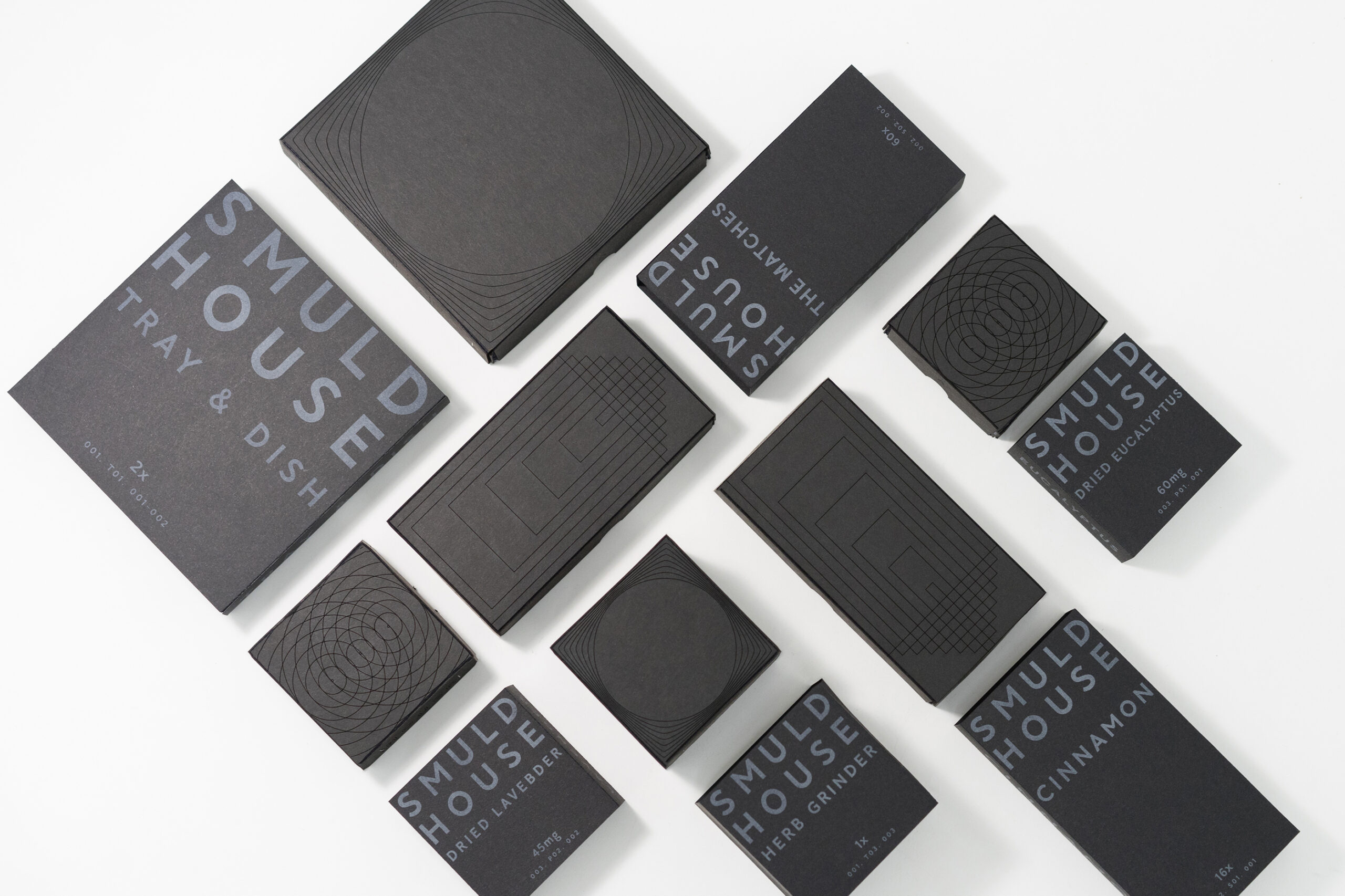 package design for an aromatherapy kit, titled smuld house, with different products in small boxes, ranging from dried eucalyptus to a tray and matches