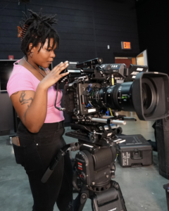 student working with camera