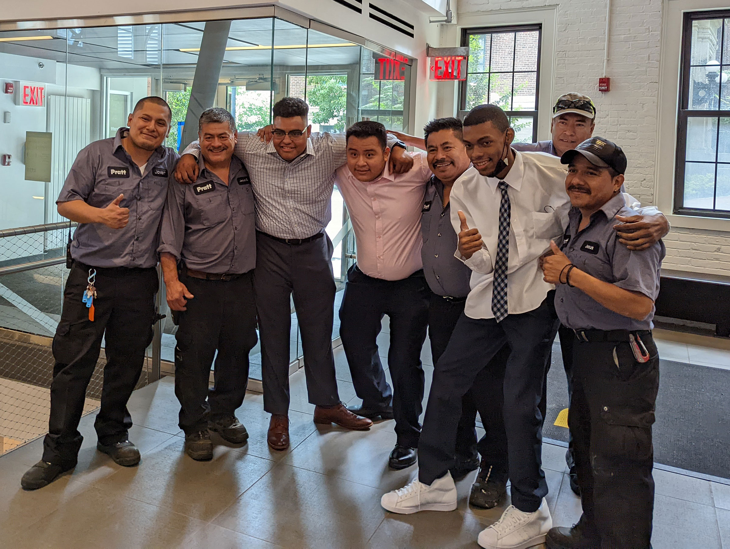 Interns celebrating graduation with Facilities Department colleagues. L-R (front row): Javier Sedeno-Cuellar, Jesus Guzman, Jesus Mejia, Alexis Alejo Vazquez, Martin Macareno, Jamel Bowe, Jesus Robles; (back row): Camillo Vazquez